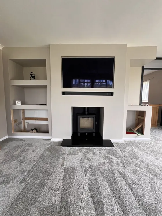 Fireplace opening prepared for a new stove installation